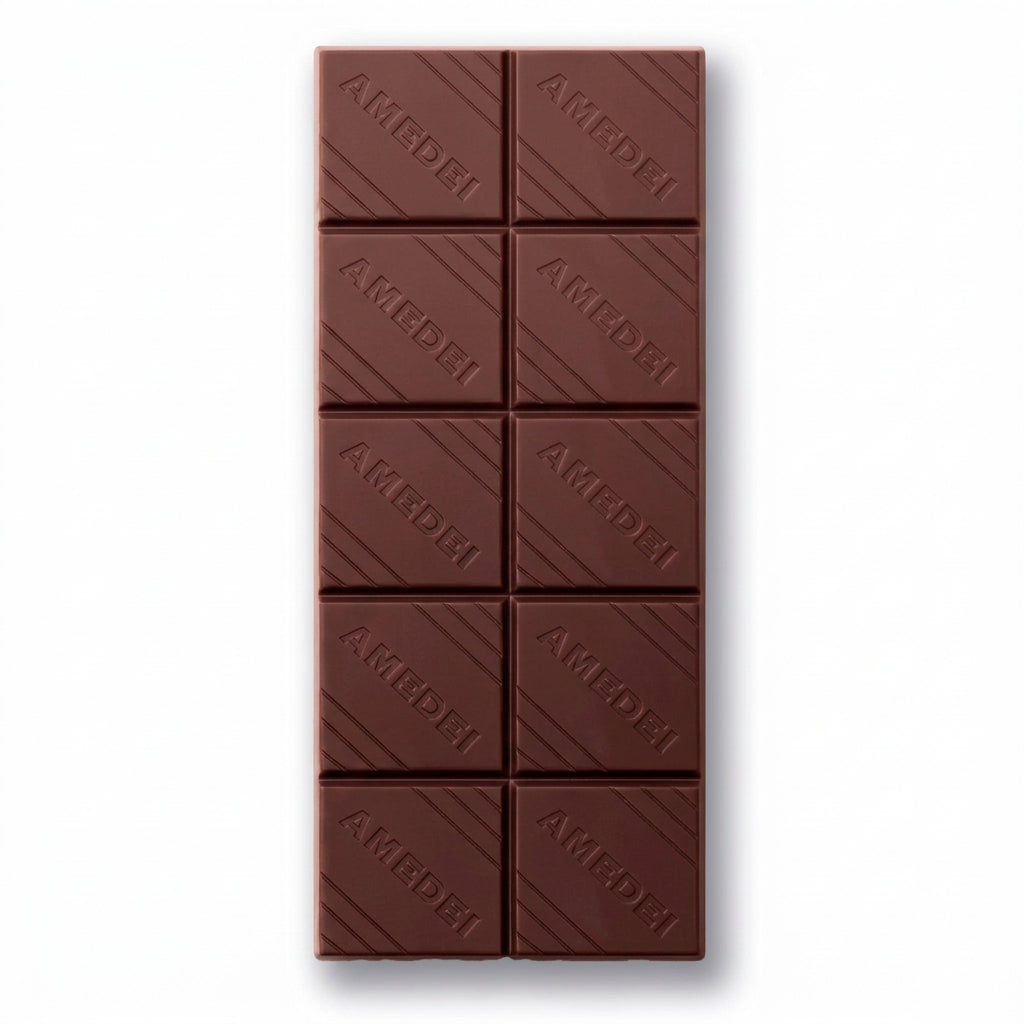 Chocolate bar with 'Amedei' branding on a white background