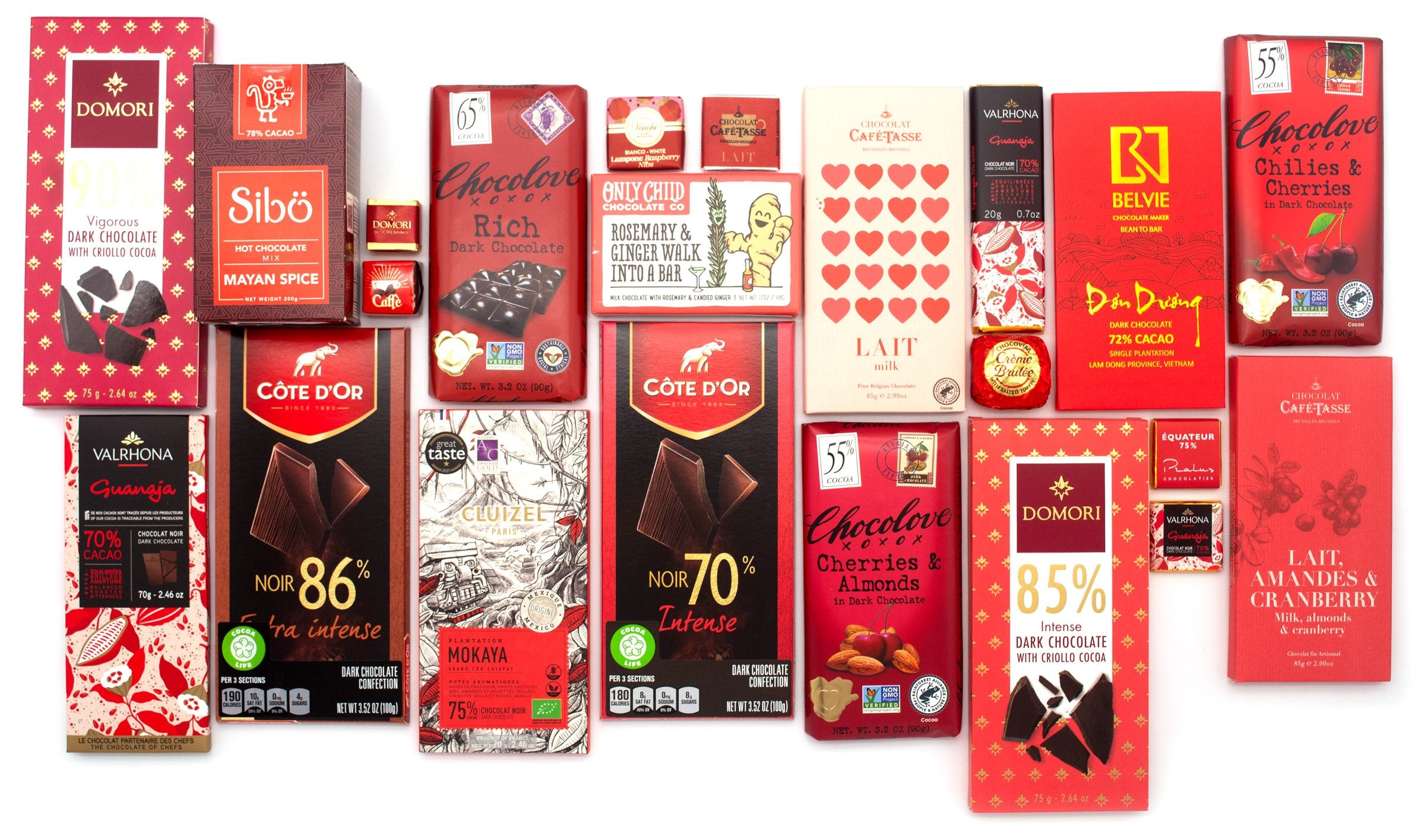 Collection of various chocolate bars in different packaging styles predominantly in red colors.