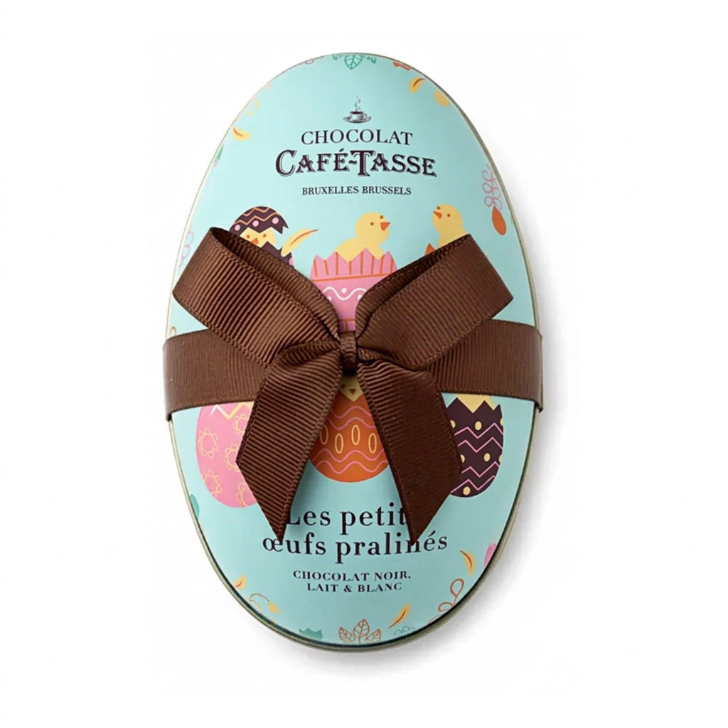 Café-Tasse 12 Assorted Chocolate Praline Eggs in an Egg-Shaped Tin - 144g