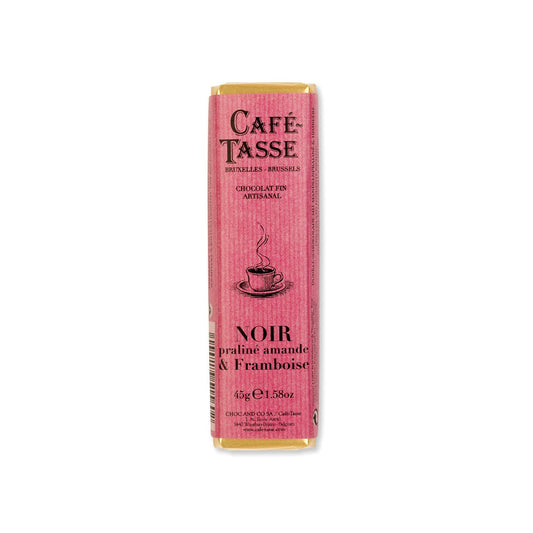 Café Tasse chocolate bar packaging with pink and gold design on a white background