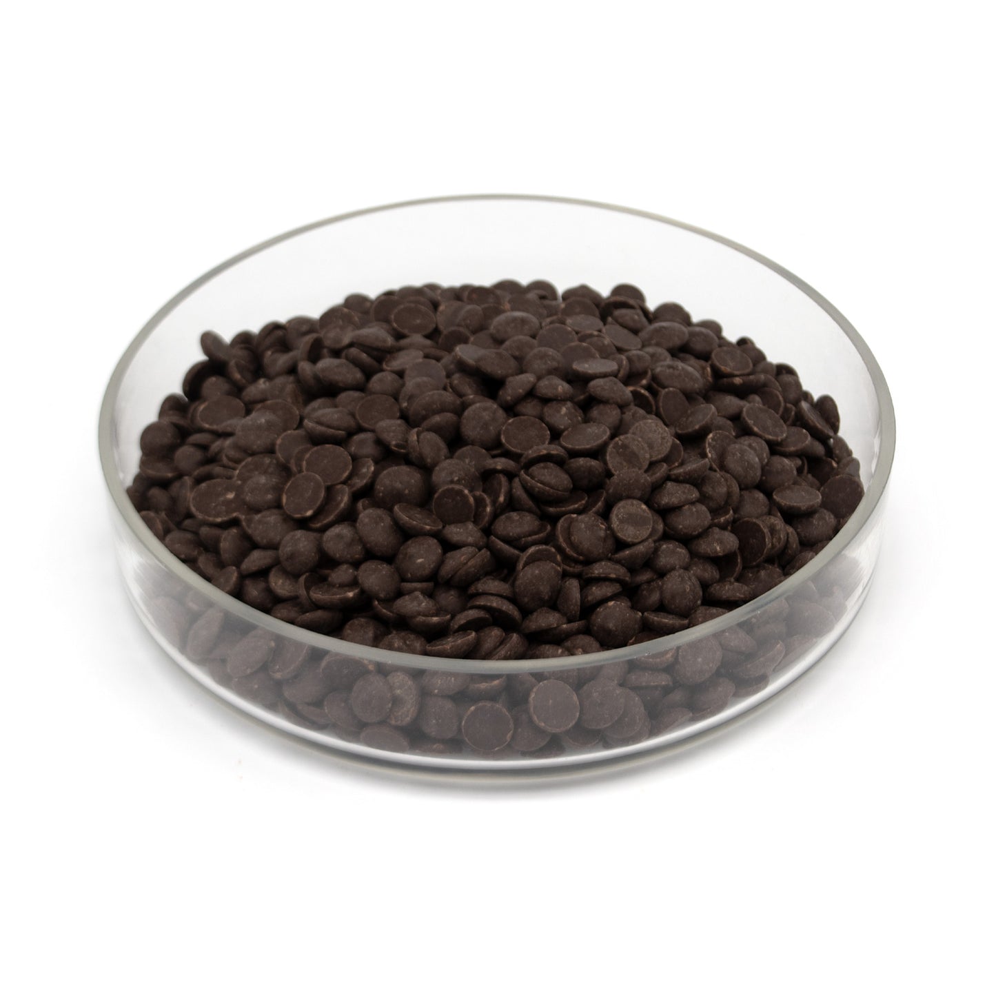 Dark chocolate chips in a clear glass bowl on a white background.