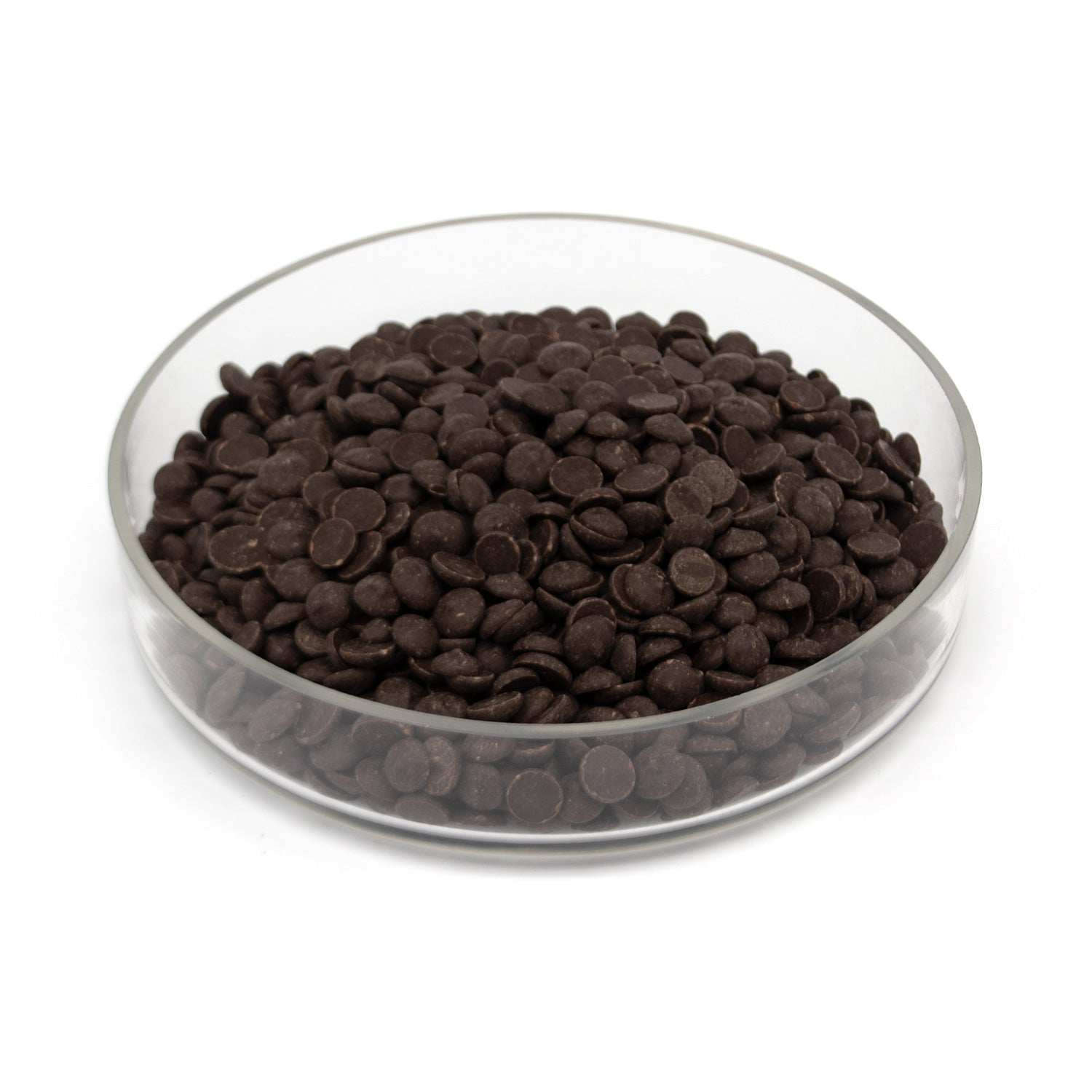 Dark chocolate chips in a clear glass bowl on a white background.