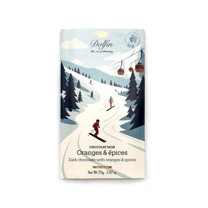 A package of Doffin Chocolat Noir Oranges & épices chocolate, featuring a winter ski resort illustration on the front with skiers, pine trees, and cable cars.