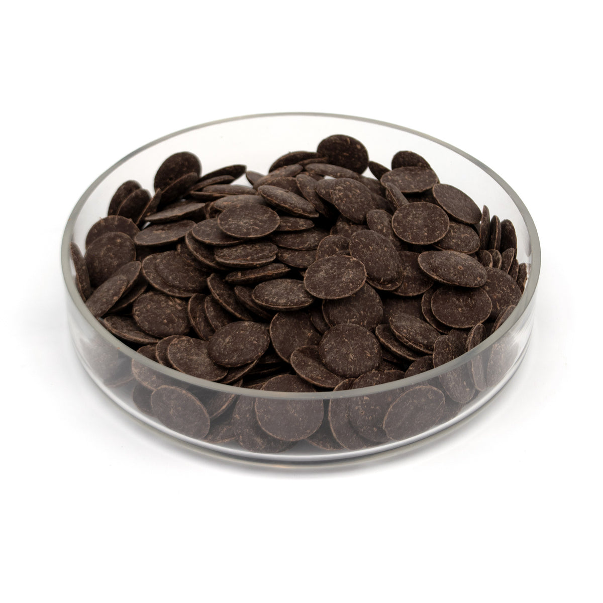 Glass container filled with dark chocolate wafers on a white background
