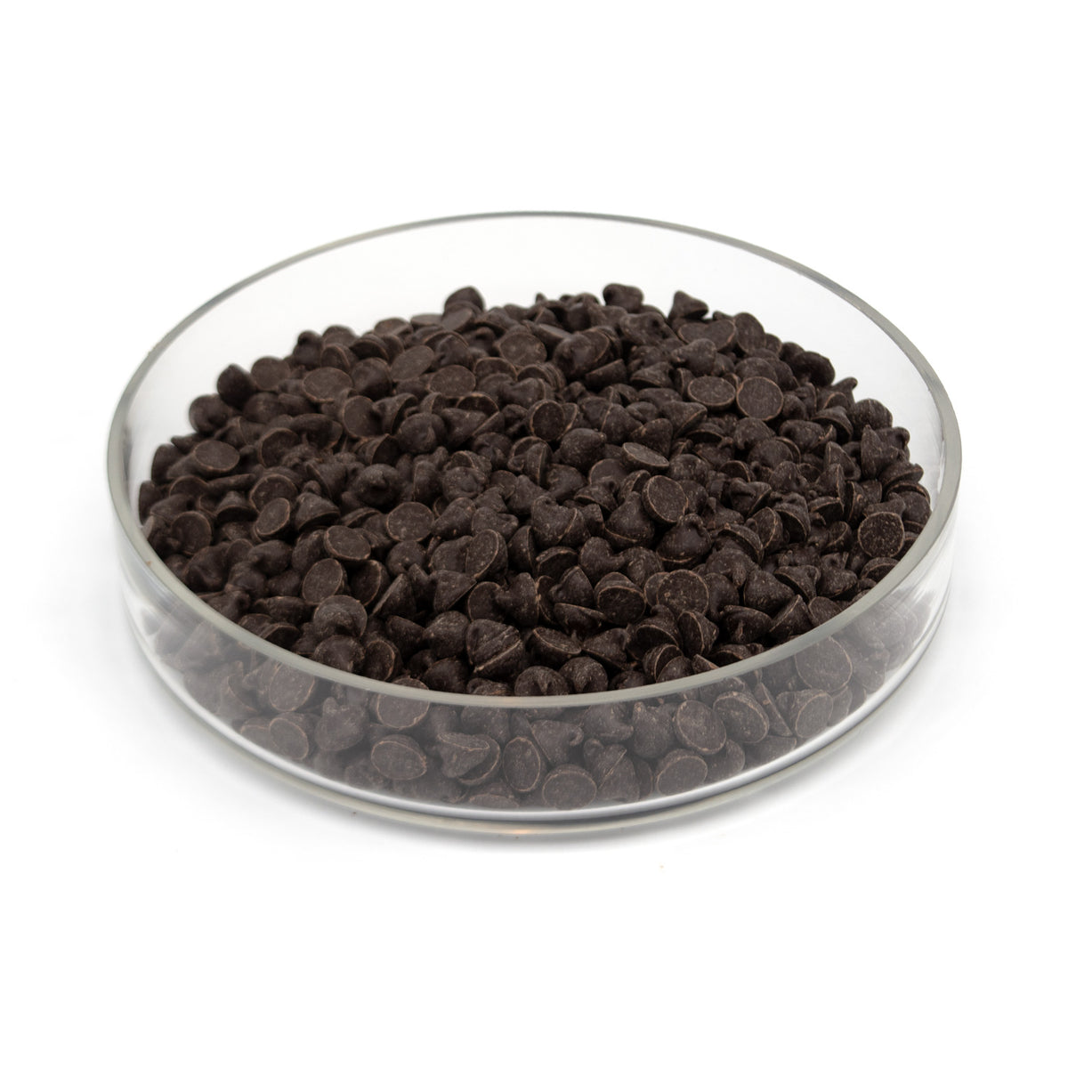 Dark chocolate chips in a clear glass bowl on a white background.