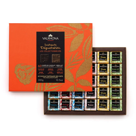 Valrhona chocolate assortment with an orange box on a white background